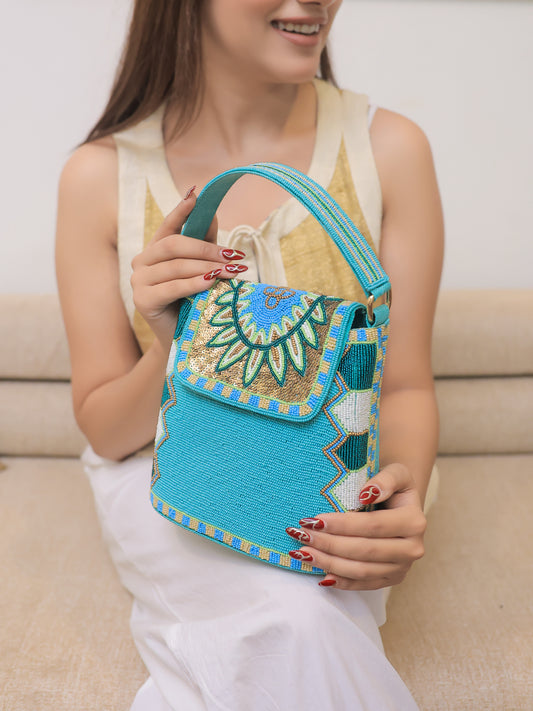 Turquoise Bucket Bag with a flowery flap