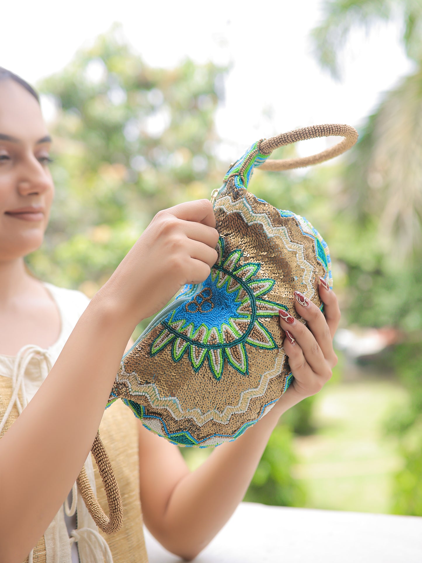 Turquoise Potli with the Copper Design