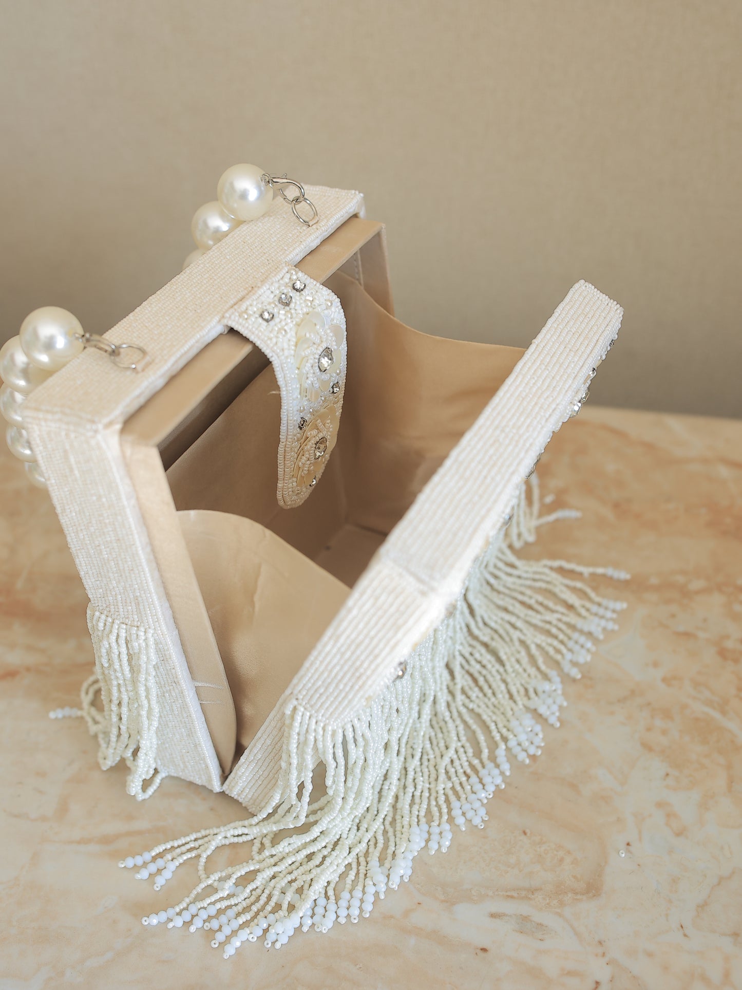 Cream Shell and Stone Box Bag with Tassels