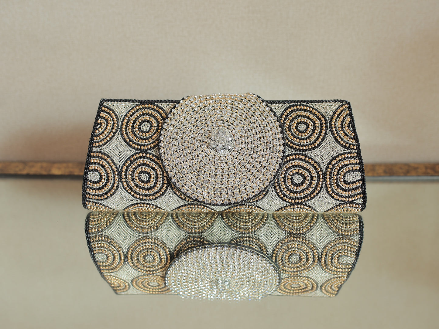 Black and Copper Circular Pattern Diamontee Round Flap Clutch