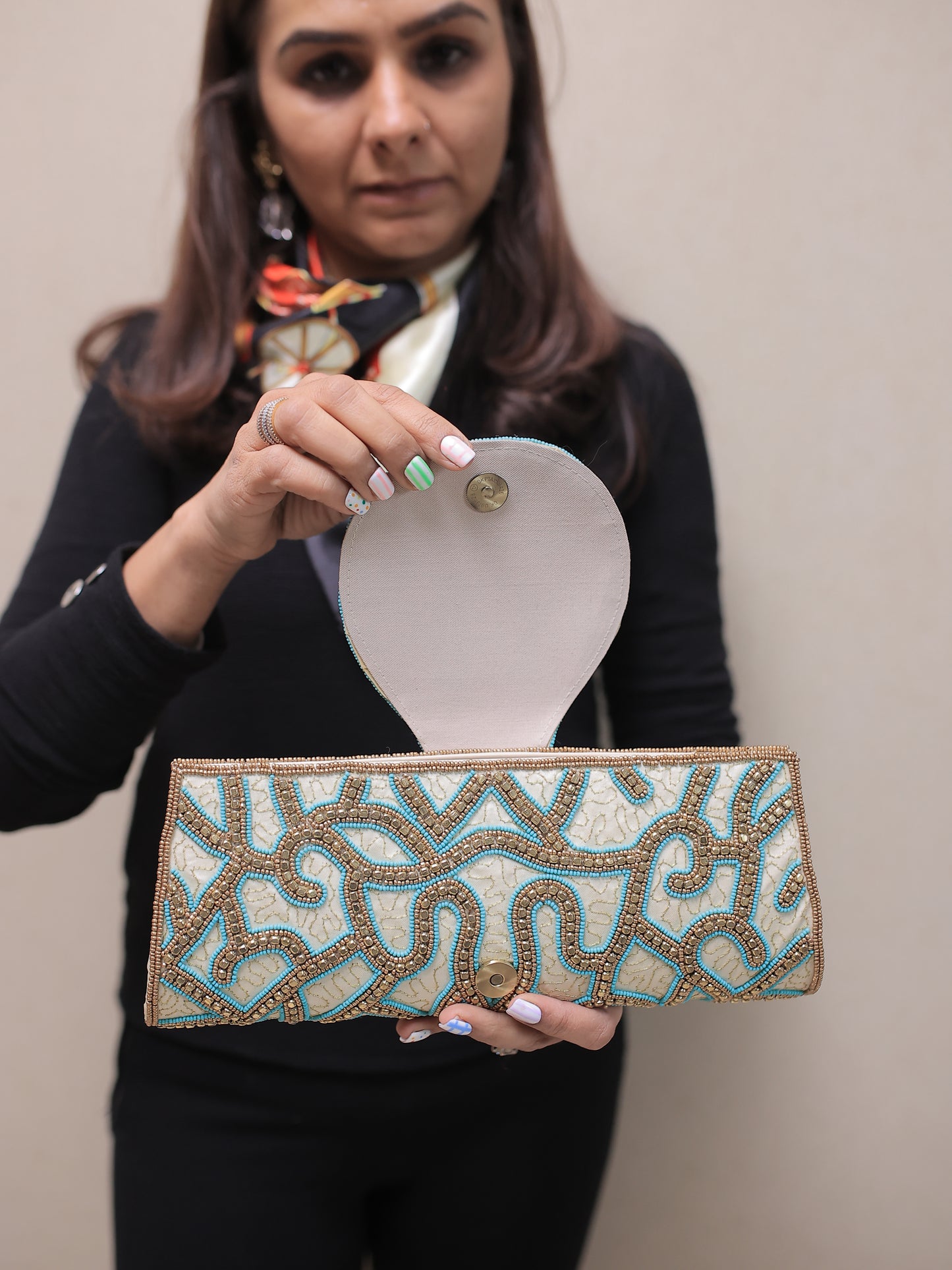 Beige and Turquoise Clutch with Round Flap and Sling