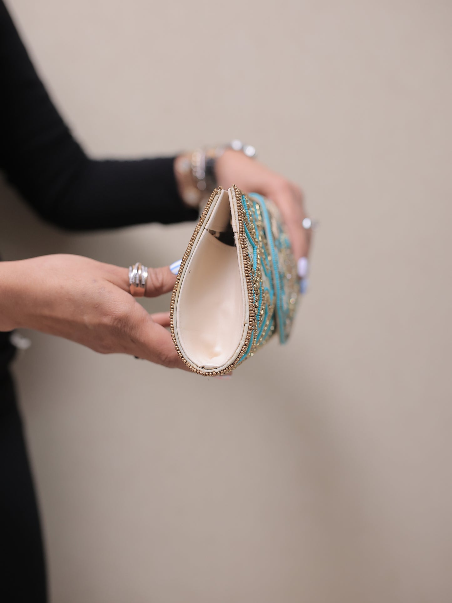 Beige and Turquoise Clutch with Round Flap and Sling