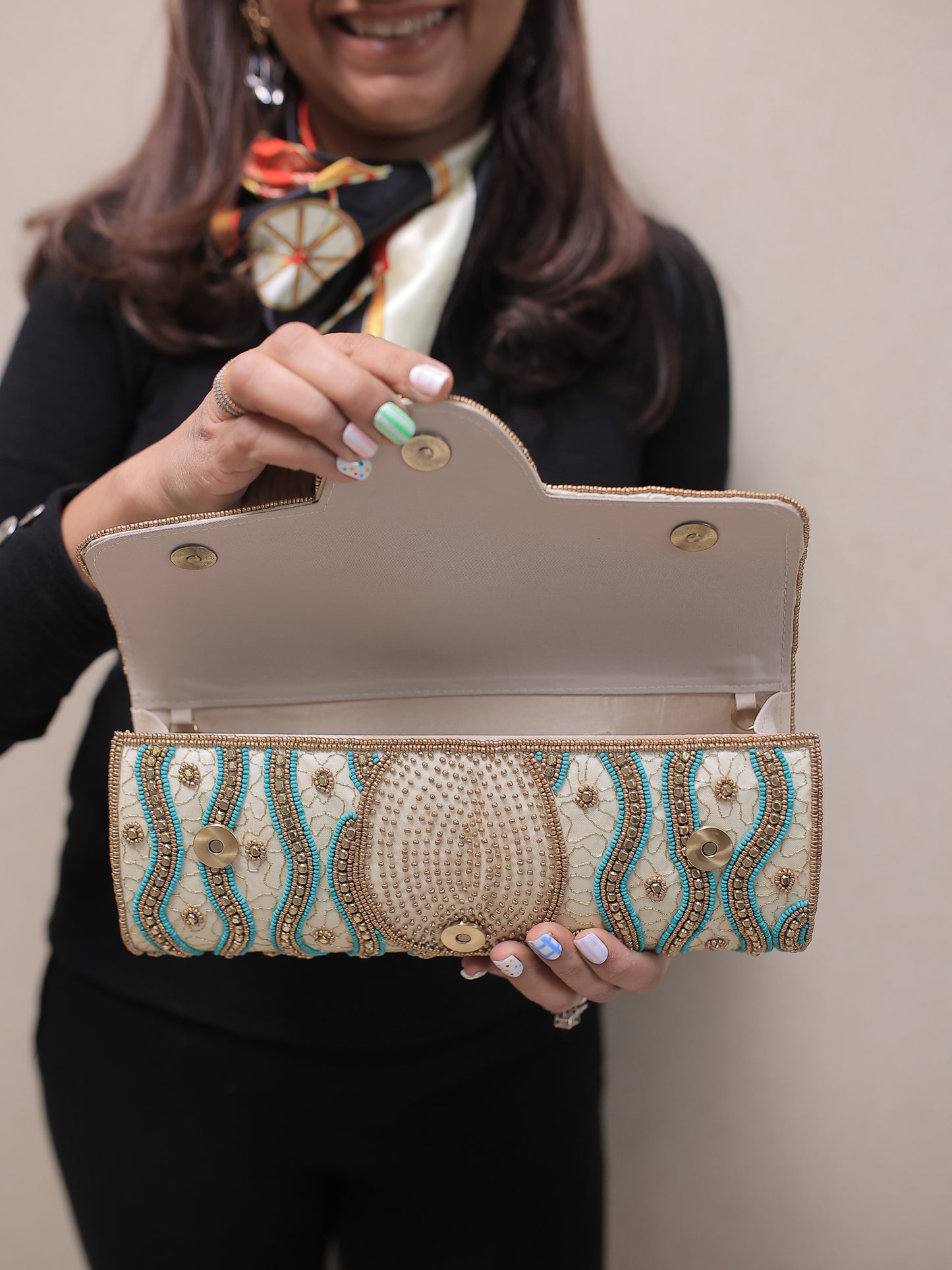 Beige and Turquoise Clutch with Round Flap and Sling