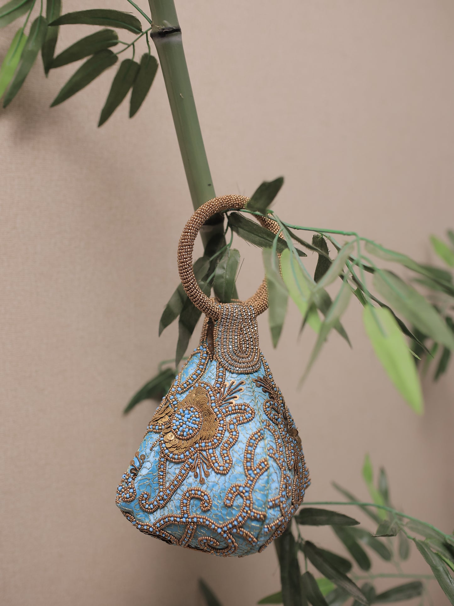 Turquoise Potli with Bead and Brass Work