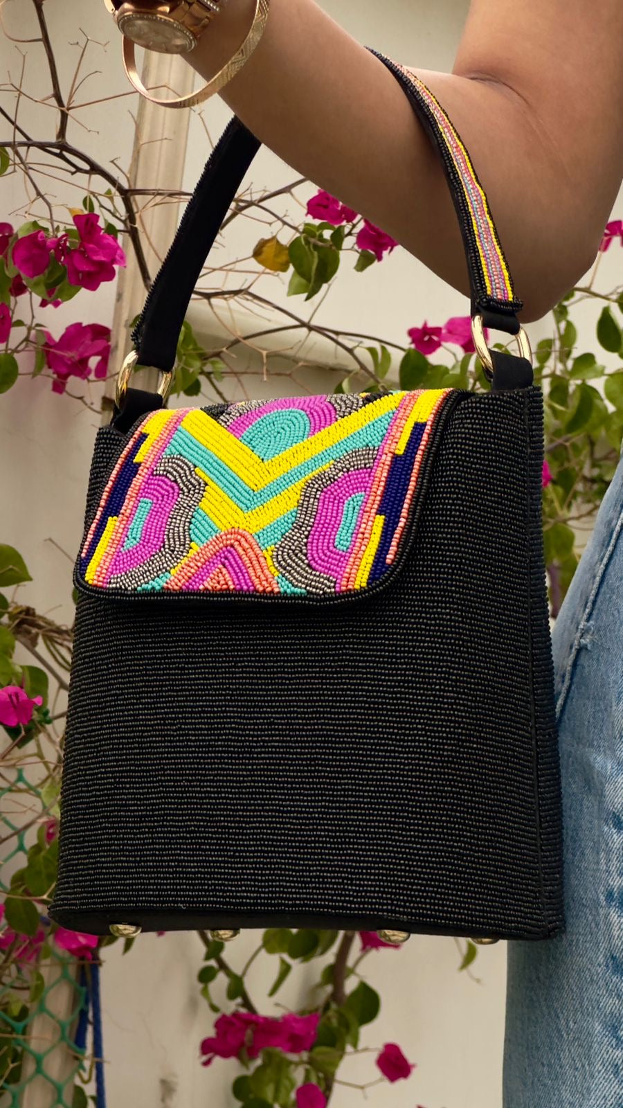 Plain Black Bucket Bag with a Colourful flap