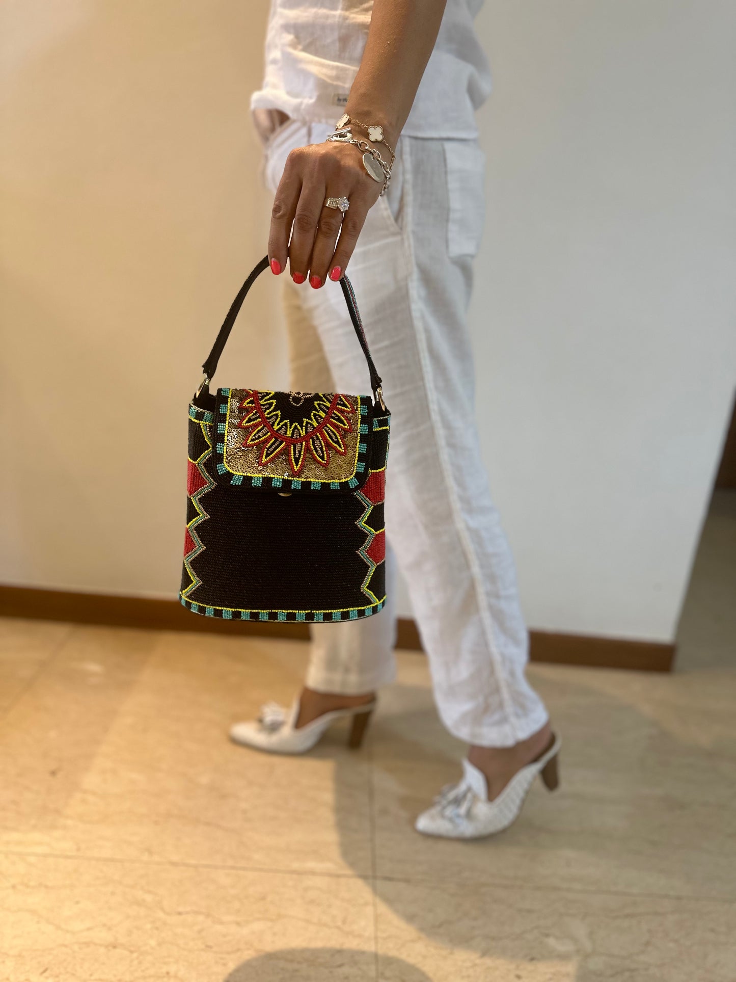 Black Bucket Bag with a multicolour flap