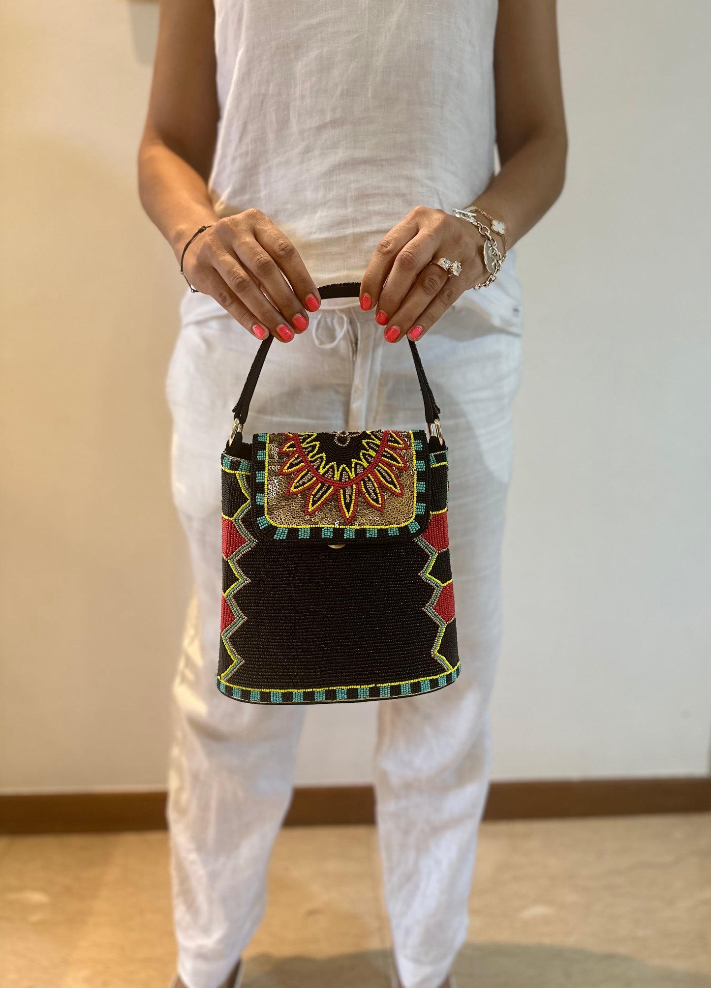 Black Bucket Bag with a multicolour flap