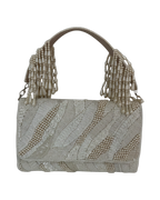 The Ivory Tassel Clutch