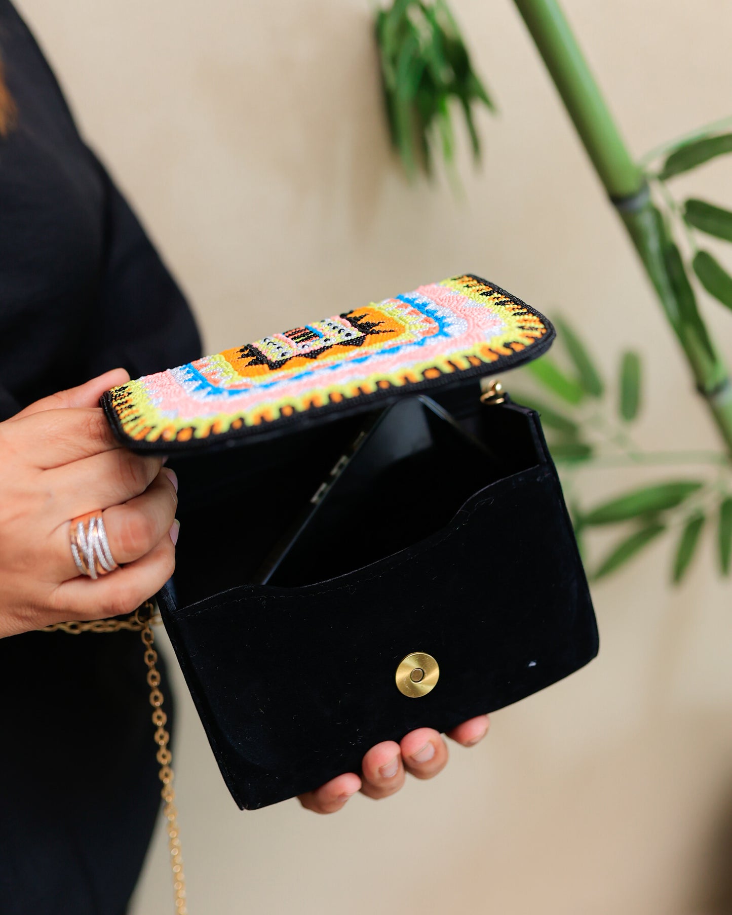 Black Clutch with a Colourful Flap