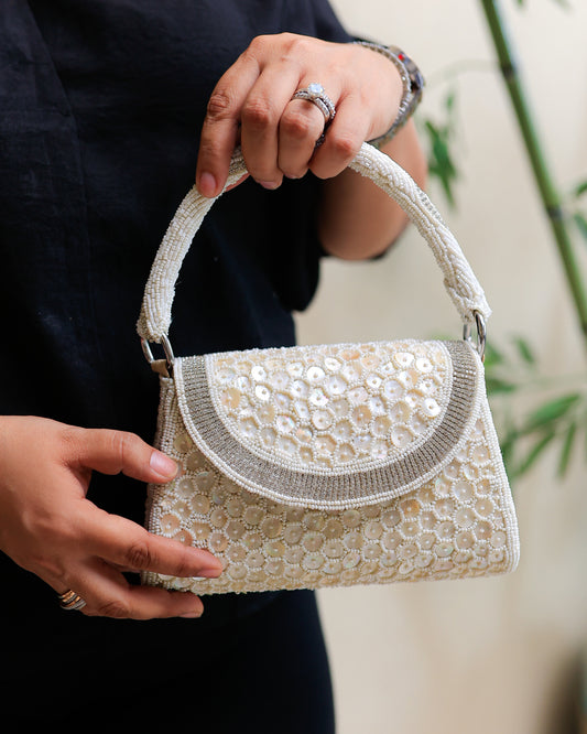 Cream Shell Clutch with a Small Beaded Handle