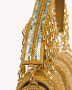 The Soleil Tassel Clutch