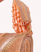 The Rosé Tassel Clutch